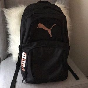 gold puma bag